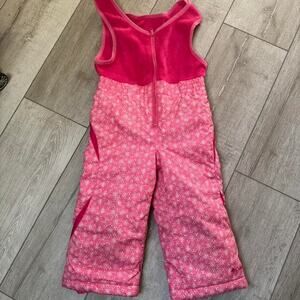 Pink and white ski snowsuit